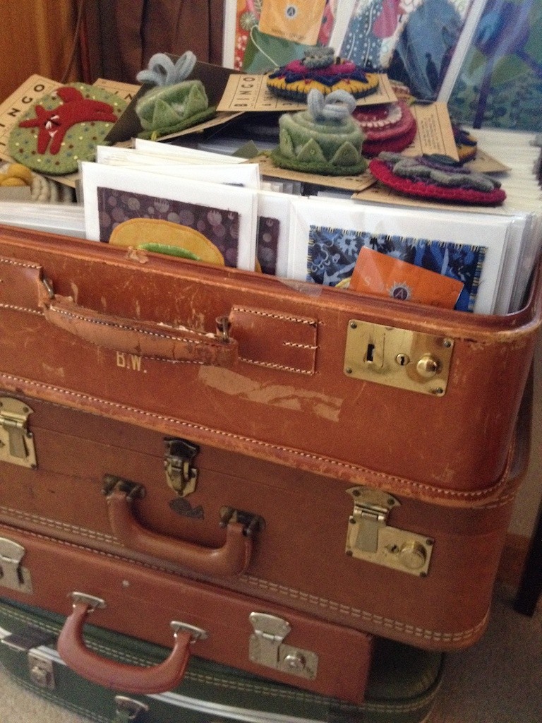 Vintage suitcases for product display Photo credit: Amy Mundinger