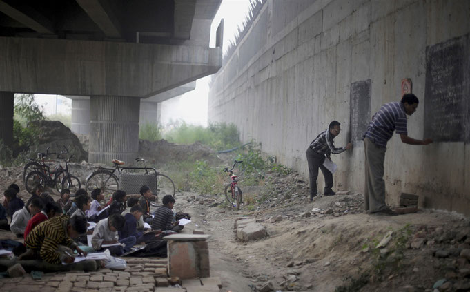 Altaf Qadri . November 8th, 2012  A free school under a bridge in India