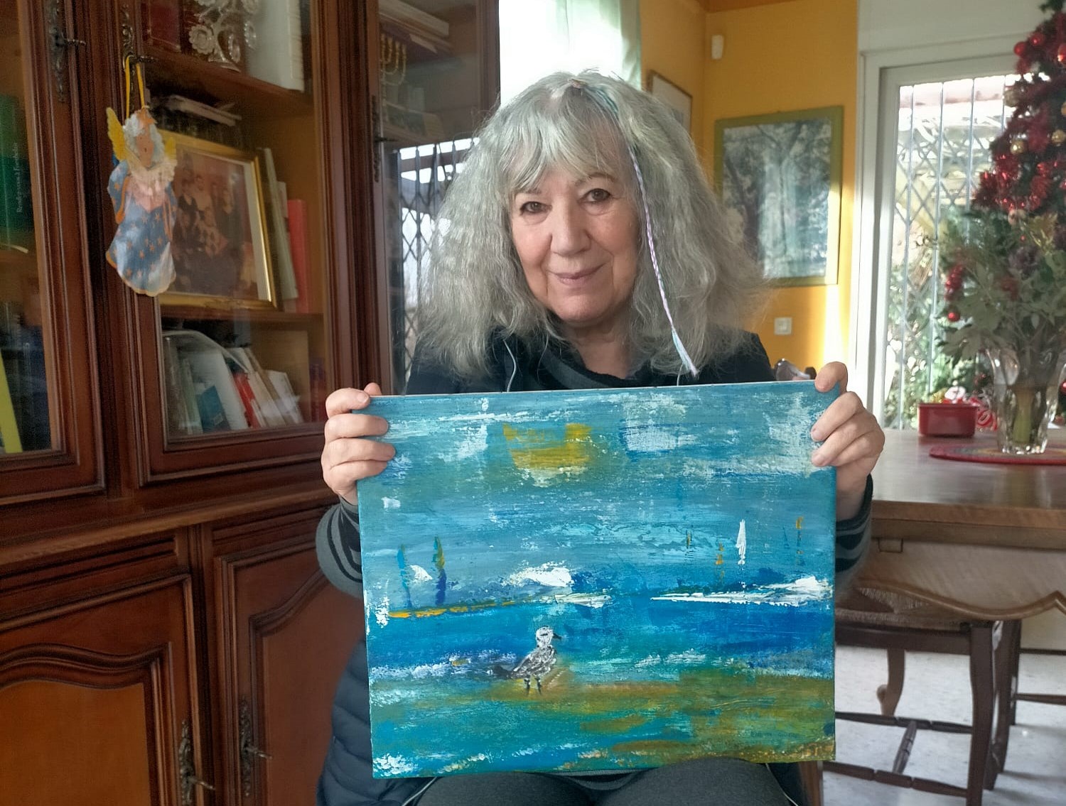 L'auteure et la toile de Carole Croity Guère