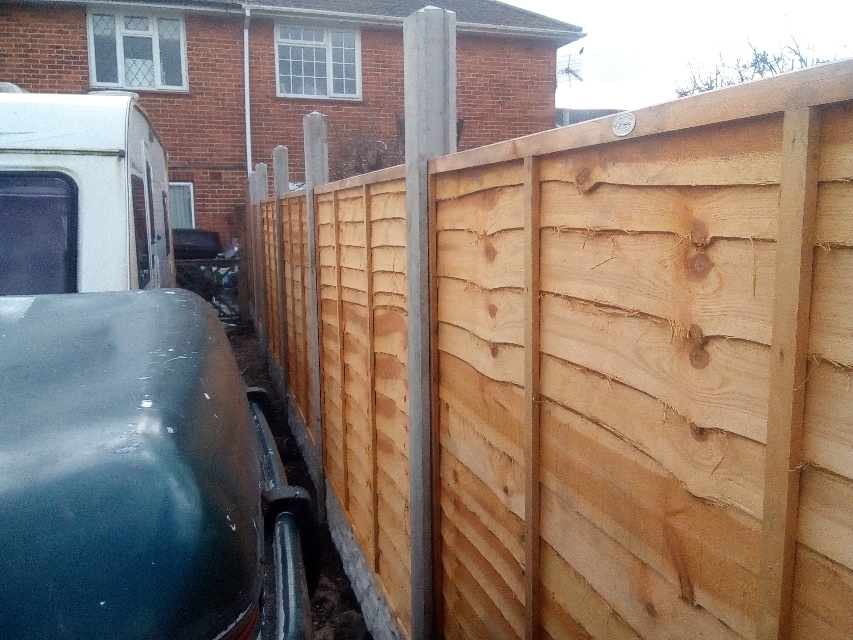 Slotted Concrete Fencing Posts (Waiting for trellis panels to be installed on top of fencing panels)