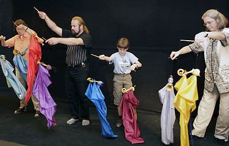 Group dancing with cloth figures