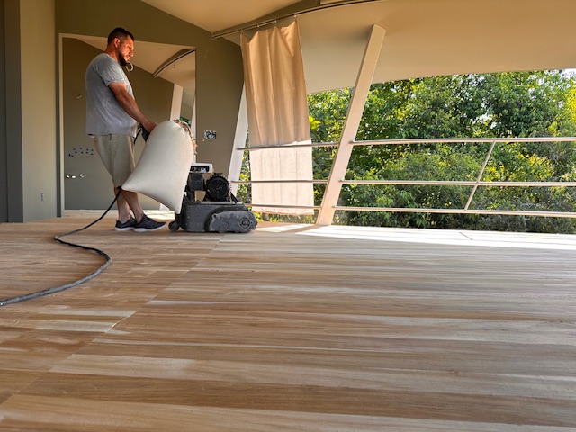 January 2024 - Don Henry sanding the wooden floor in the bedroom