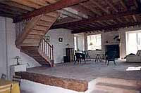 Escalier à noyau avec volute de départ et balustres en bois tourné