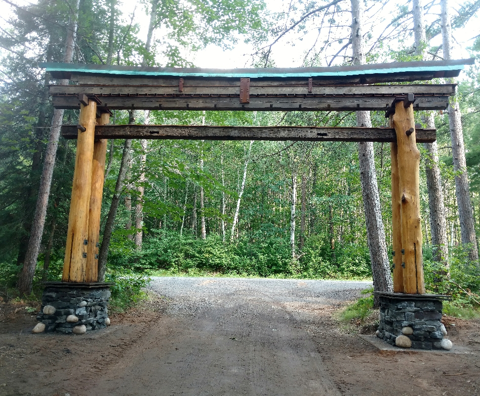 A Torii inspired entry made from old hand hewn barn beams