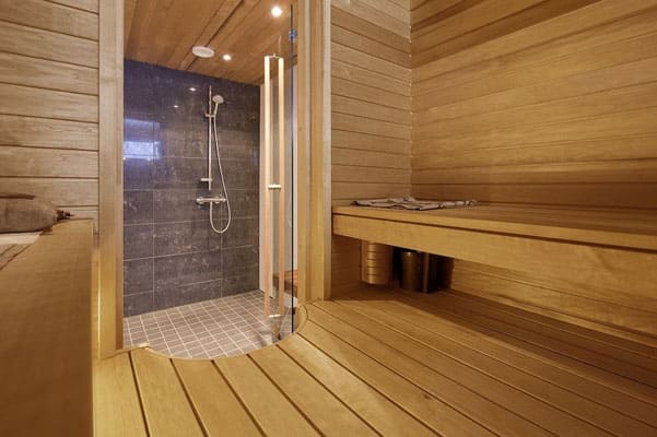 Wohnblockhaus mit finnischer Sauna - Blockhaus mit Wellness - Finnische Holzhäuser