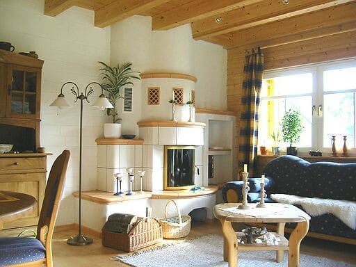 Bauen Sie Ihr nachhaltiges Holzhaus in attraktiver, schwindungsfreier Blockbauweise mit Kamin 