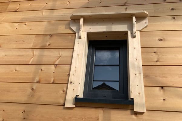 Wohnblockhaus - Fenster - Fensterbauer - Einfamilienhaus -Blockhausfenster - Bauen im Winter - Blockhausbauer - Winterbau  