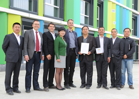 Xingfubao Passivhaus urumqi: Das Kernteam bei der Eröffnung