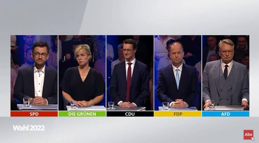 V.l.n.r.: Thomas Kutschaty (SPD), Mona Neubaur (Grüne), Hendrik Wüst (CDU), Joachim Stamp (FDP), Markus Wagner (AfD). (Quelle: WDR Wahlarena zur Landtagswahl NRW: Fünfkampf der Spitzenkandidat:innen/Screenshot: YouTube #WDRaktuell #Nachrichten)