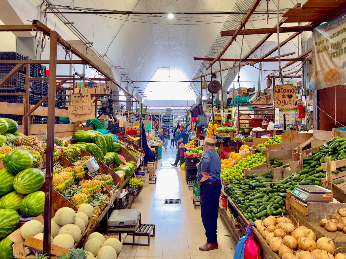 Produce stands in the Mercado Alcalde