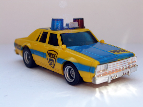 AURORA AFX Chevy Police gelb/blau