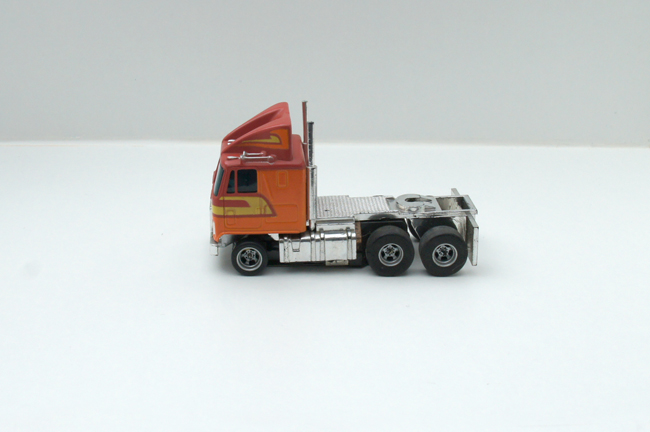 AURORA AFX GMC Astro 95 Cab Truck rot/orange/gelb