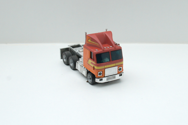 AURORA AFX GMC Astro 95 Cab Truck rot/orange/gelb