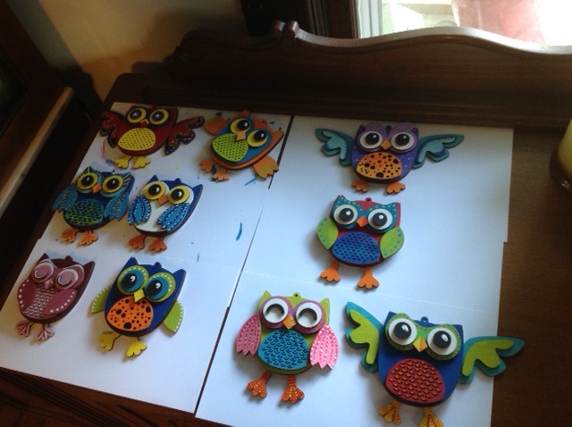 Happy little owls cut out on a laser and hand painted.