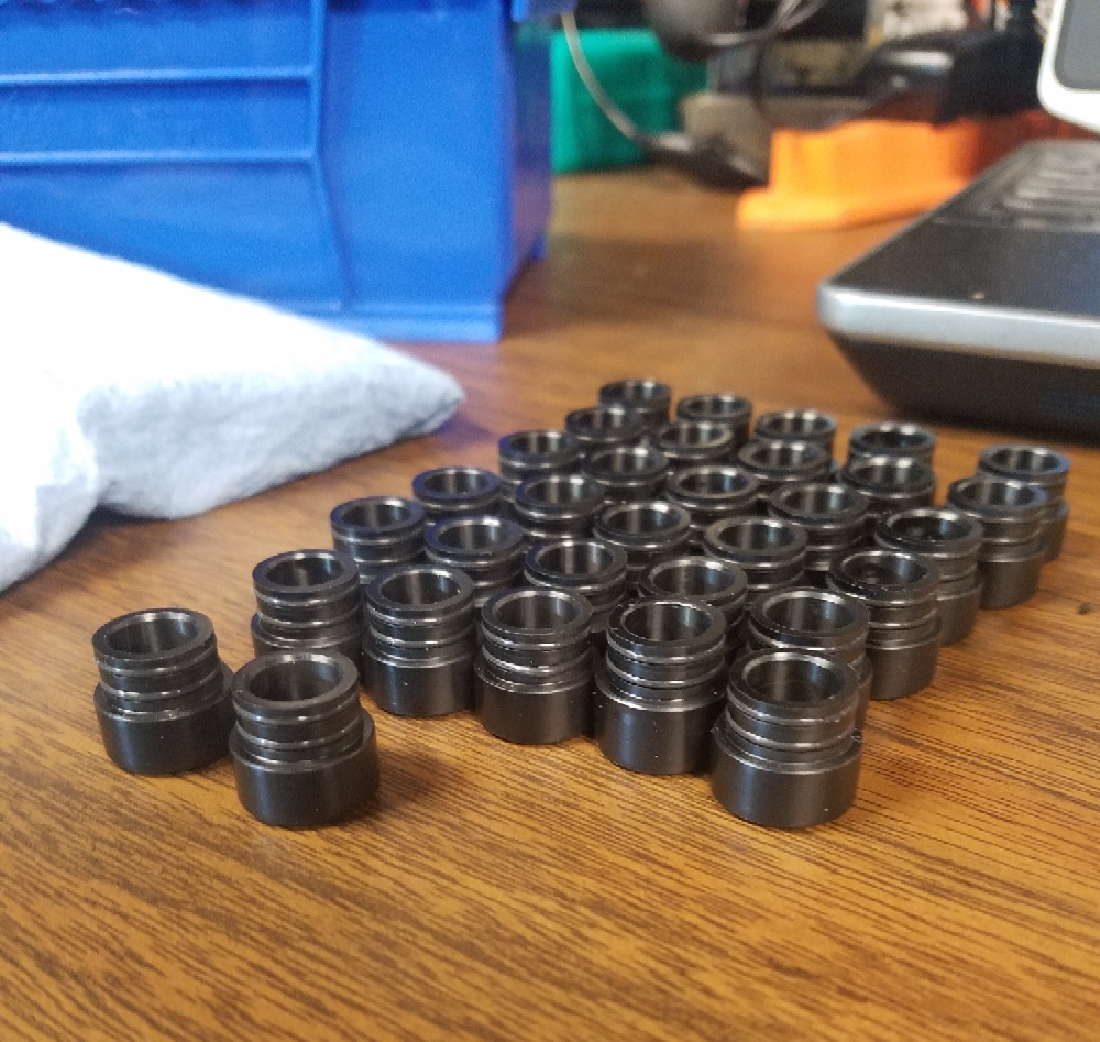 8mm to 12mm Acetal adapters. I made 175 of these total. The O-rings from "Mr. O-Ring" were high quality and very consistent. Dimensional consistency is important with  a tight tolerance part like this. You can find the "Mr O-ring shop on Amazon.com.