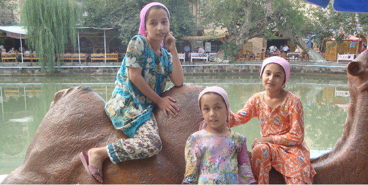 Buchara-Pond-Camel-Statue-Kids-Posing-Uzbekistan-Restaurant