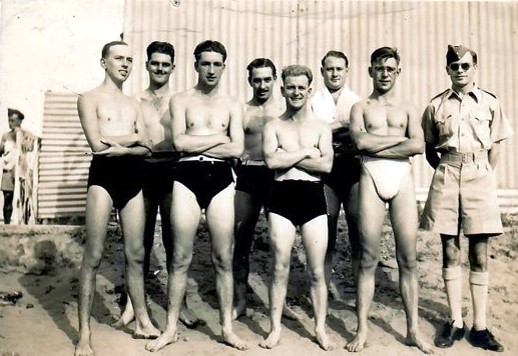 LAC Tommy Hopps (centre) - Captain of RAF Swimming team - seen in 1943 at Khartoum