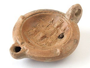 A clay lamp featuring Cybele.