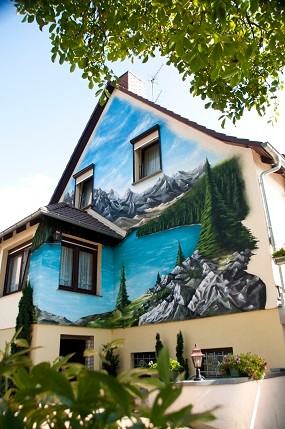 Wandbild Gebirgslandschaft,Fassadengestaltung, Wandgestaltung, Wandmalerei, Wandgestaltung, Graffitiauftrag, Auftragsgraffiti, Berlin, Brandenburg,