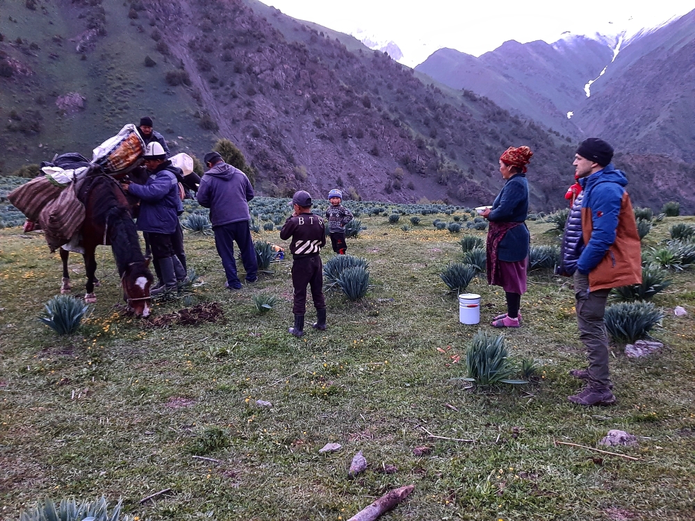 Traditional life of Kyrgyz Nomads. Welcoming  newcomers in the Konush ( Nomad camping)