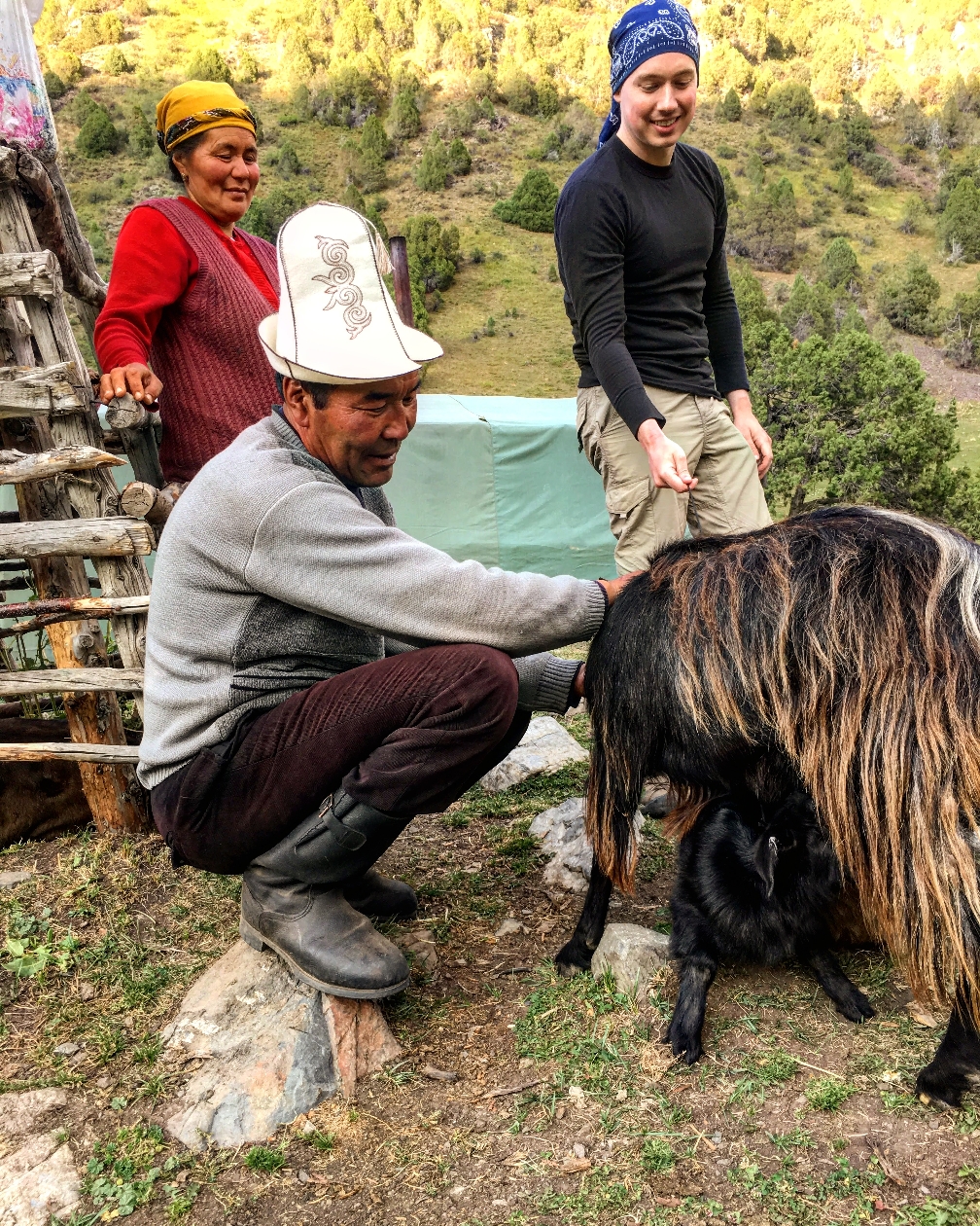 Kyrgyz nomad family. Man has Ak-Kalpak-( Kyrgyz hat )  on his head.South of Kyrgyzstan