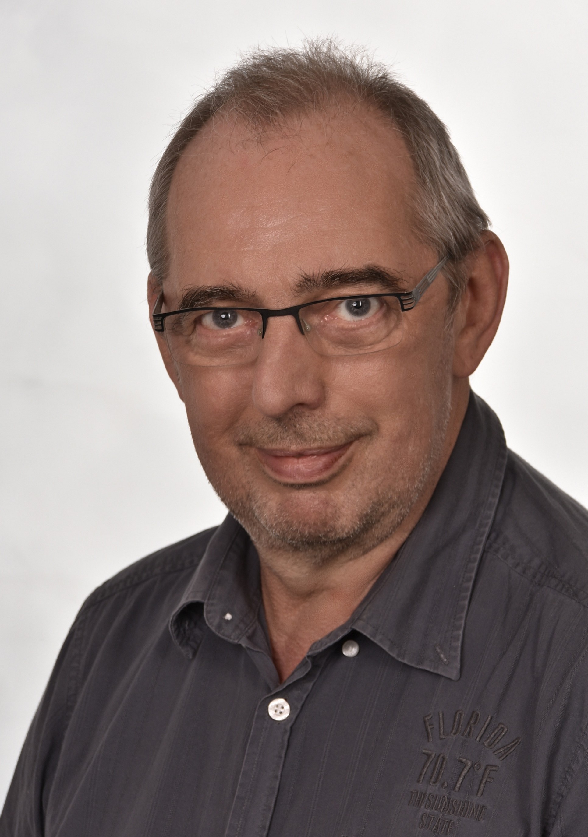 Dr. Reiner Schölles