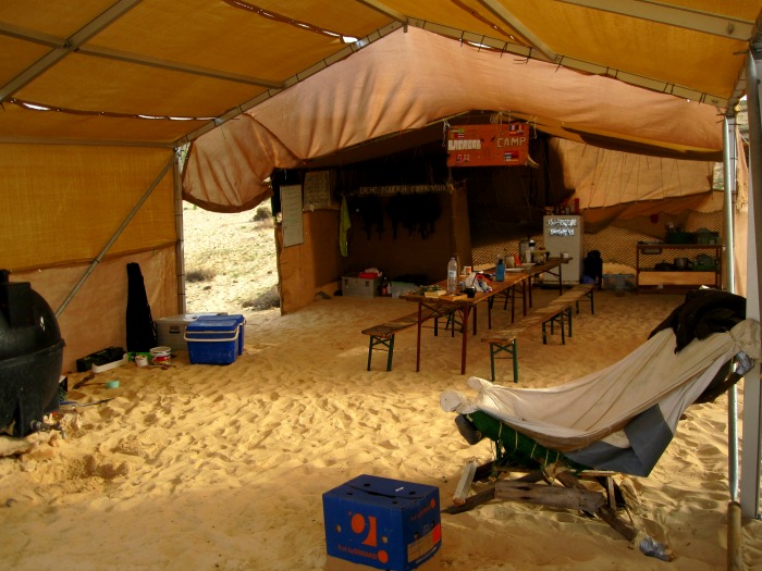 The main tent in camp, with our water supply on the left: the black tank is filled with drinkable water.