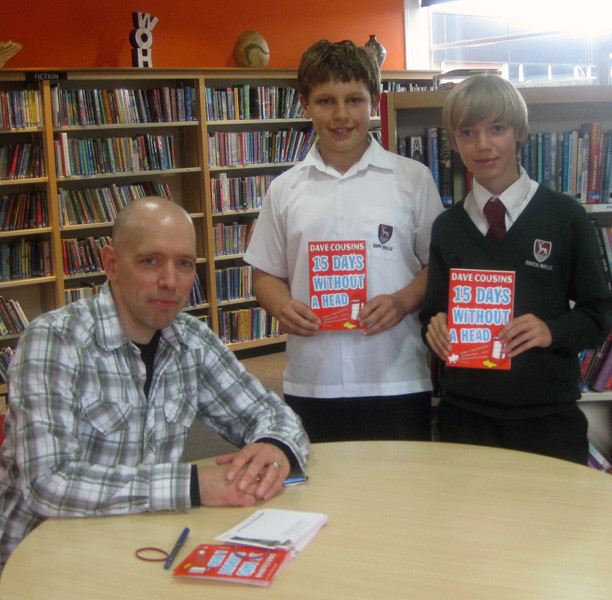 Signing books and postcards with Daniel and Nick at Simon Balle School