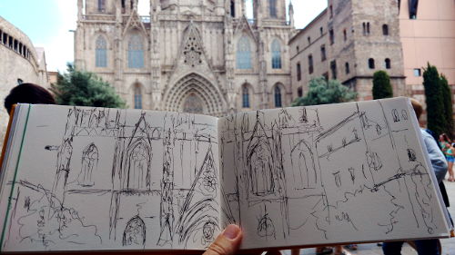 Skizzenbuch mit Zeichnung der kathedrale im gotischen viertel in barcelona. hintergrund kathedrale