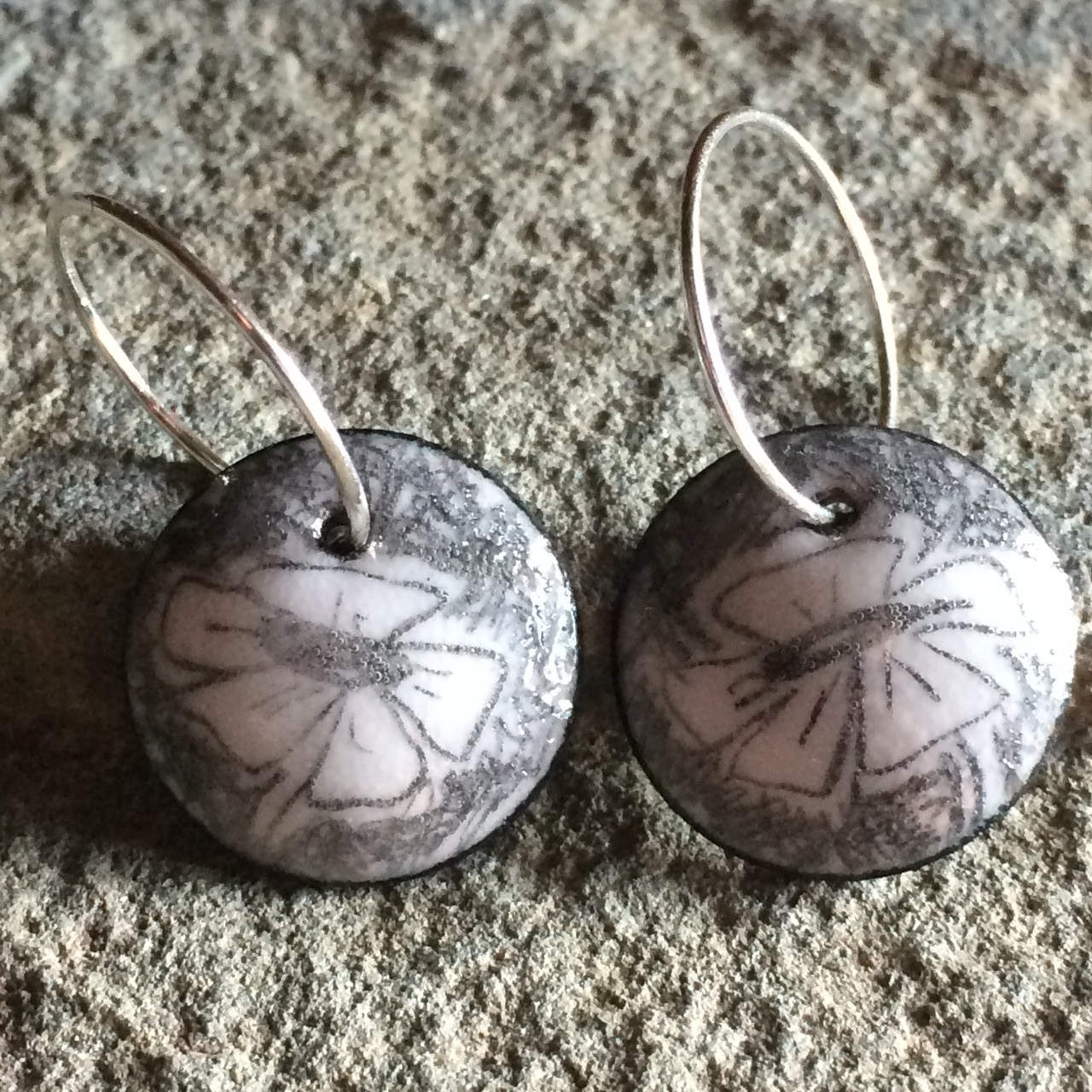 graphite + enamel. handcrafted jewelry in metal, enamel, and stone