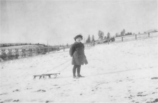 1918: Winter view of the bridge on Forker Road by the intersection with Moffat and Judkins (bridge built in 1905 and taken down in 1922). Sister Vivian Johnson