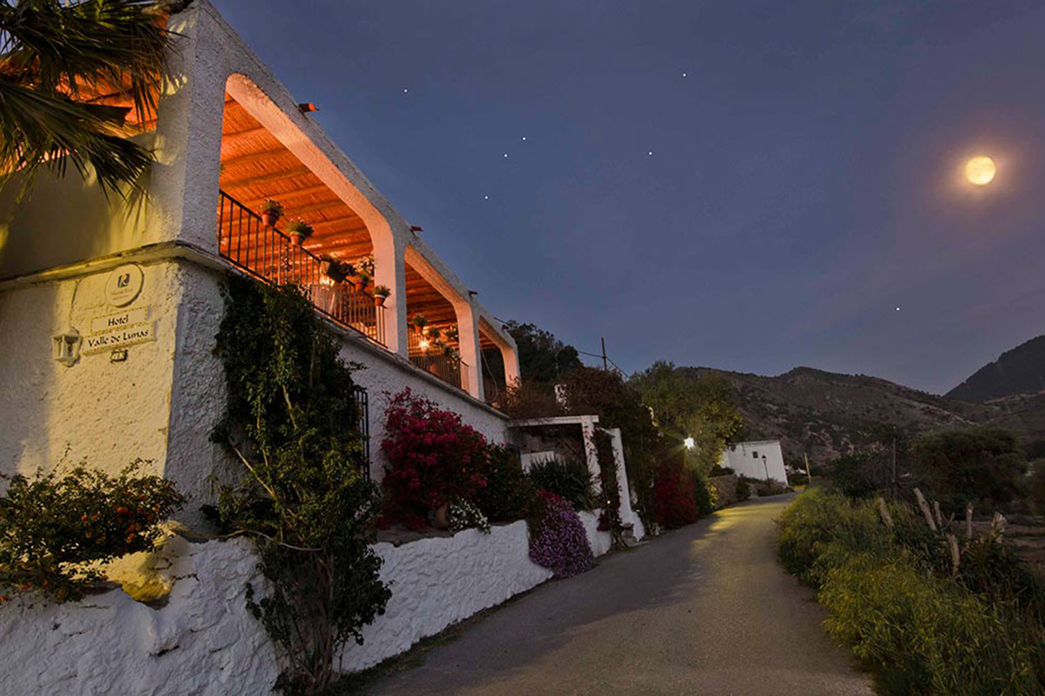 Front view of the complex by night