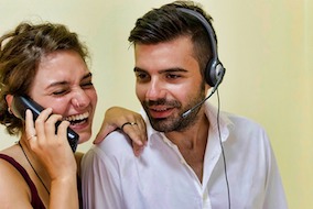 Two People on the Telephone representing to Call a Psychic and getting a reading