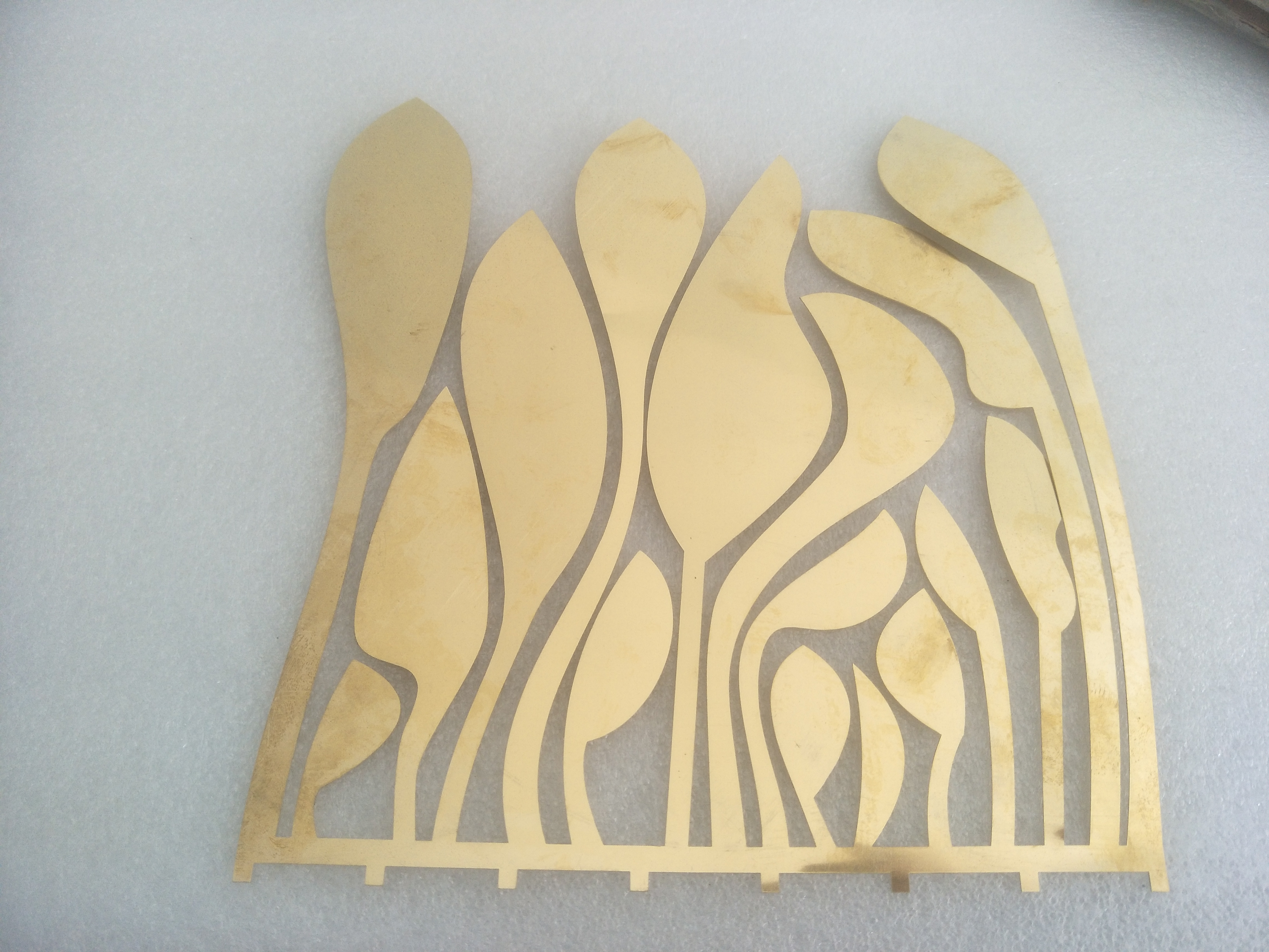 0.8mm thick bright brass laser cutting