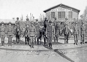 El Paso, Texas 1927 U.S. Immigration Service Border Patrol inspectors in formation in front of the Border Patrol's first training facility in Camp Chigas.