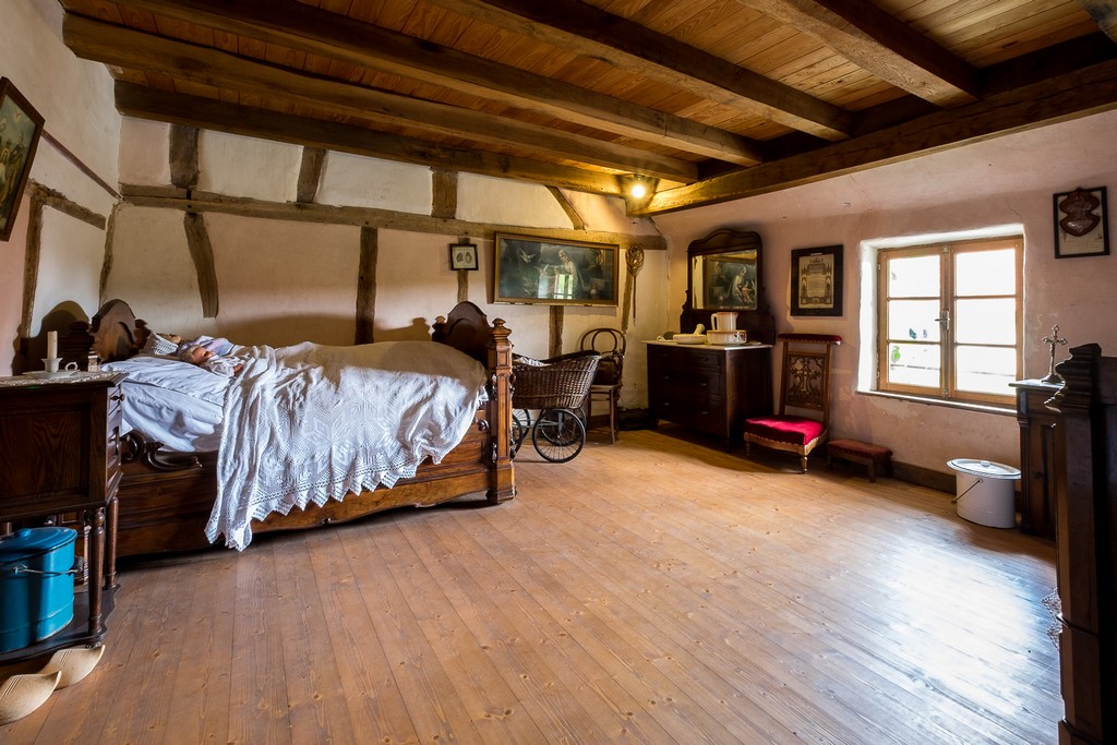 La chambre à coucher où tout la famille dort