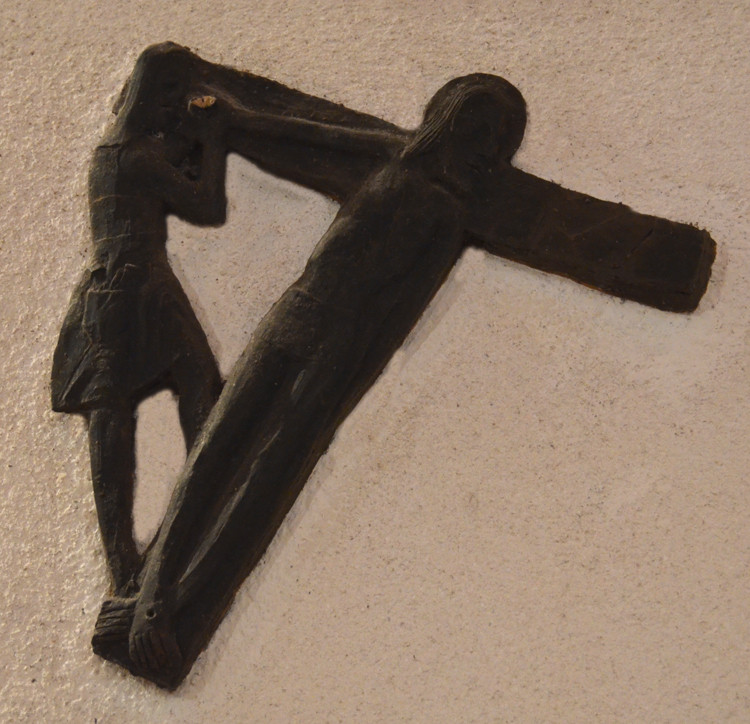 11- Jésus est cloué sur la croix