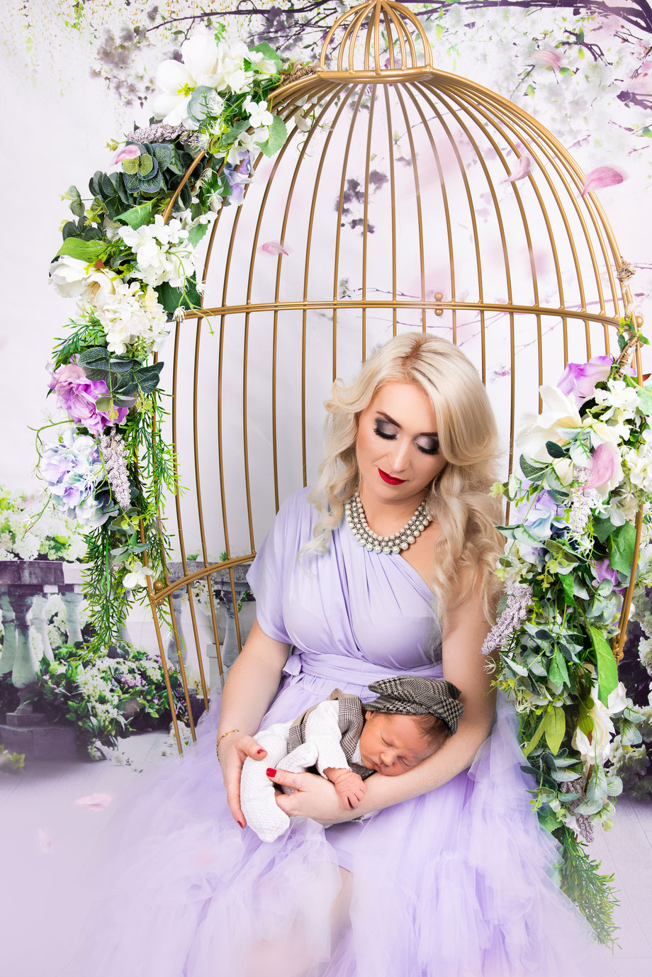 newborn shoot with cage