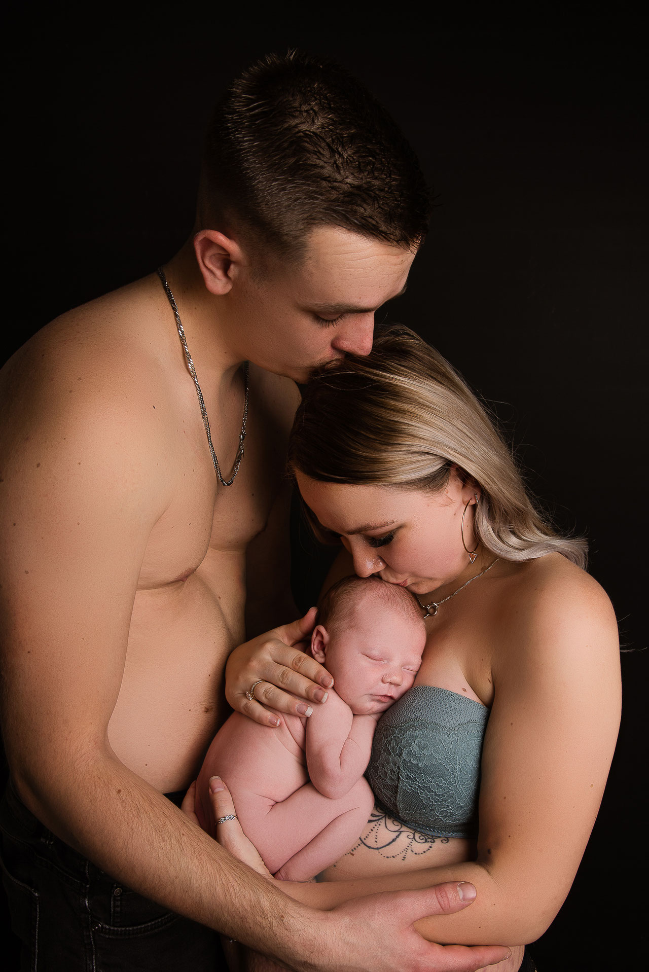 loving parents during newborn shoot