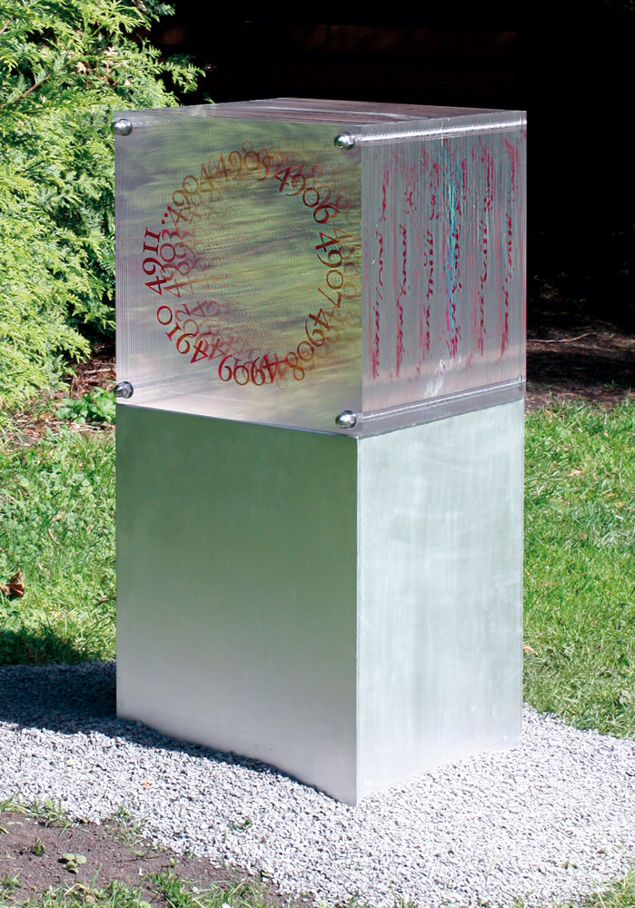 paolo-grassi-cubone-plexiglass-numeric-installation – conceptual sculpture with engraved red numbers forming a circle across transparent layers