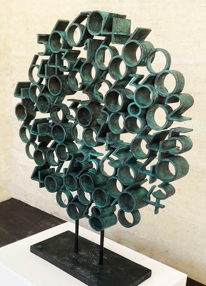 Tobia sculpture by Paolo Grassi in bronze, circular mandala of numeric rings. Symbolic piece from From “0” to Infinity.