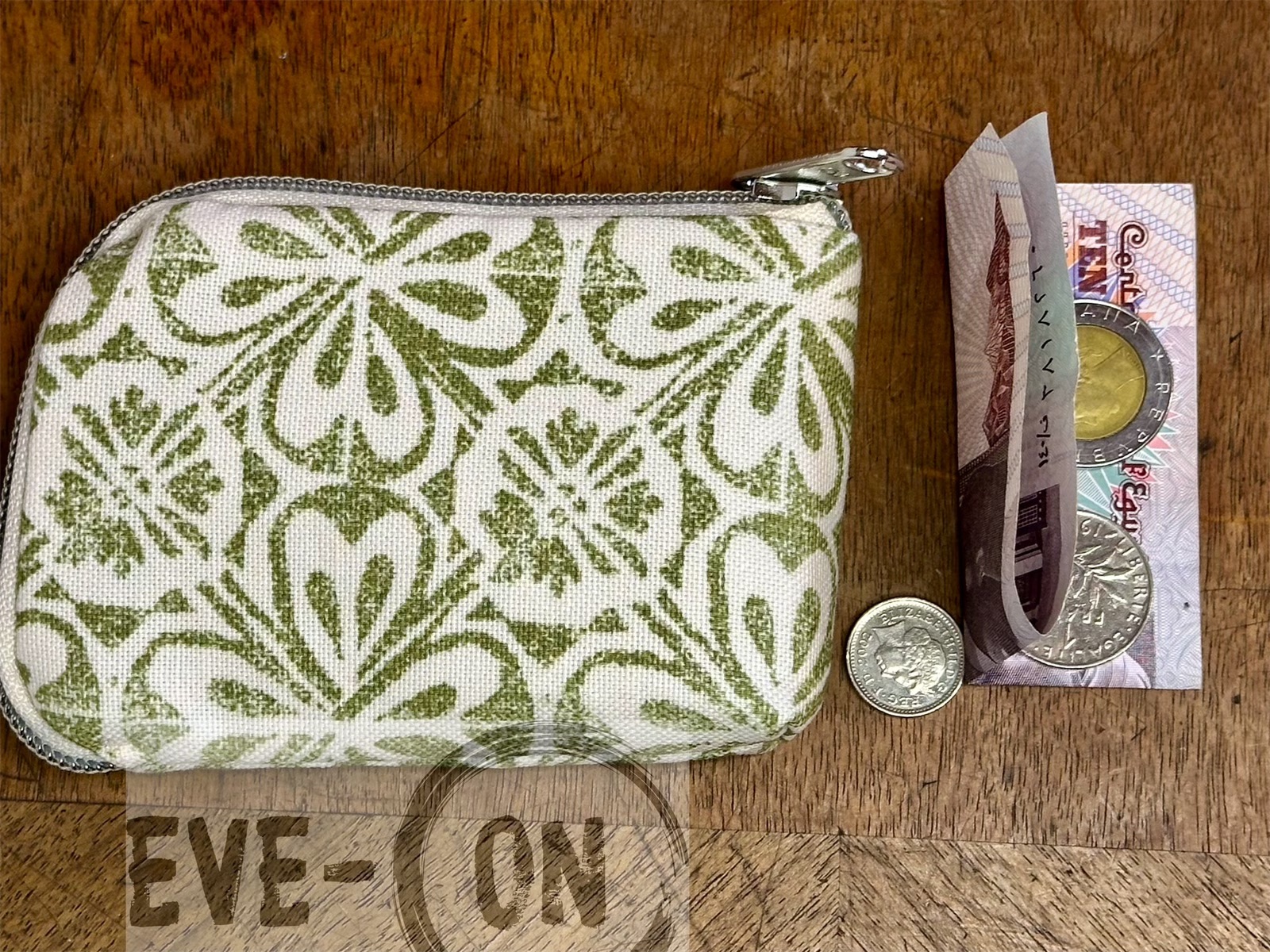 10124 Ornamente oliv auf beige