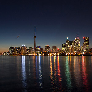 Toronto Skyline with CN Tower and illuminated Skyscrapers, Long Exposure, Night, Ontario, Canada 