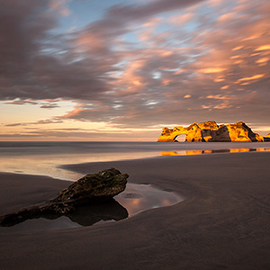 Wharariki Beach Sunset with amazing glowing rocks, New Zealand Picture Collection and Gallery