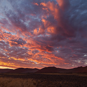 Burning Sky, Sunset at Sossusvlei Sand Dunes, Namib Desert, Namibia Naukluft Park, Namibia, Africa 