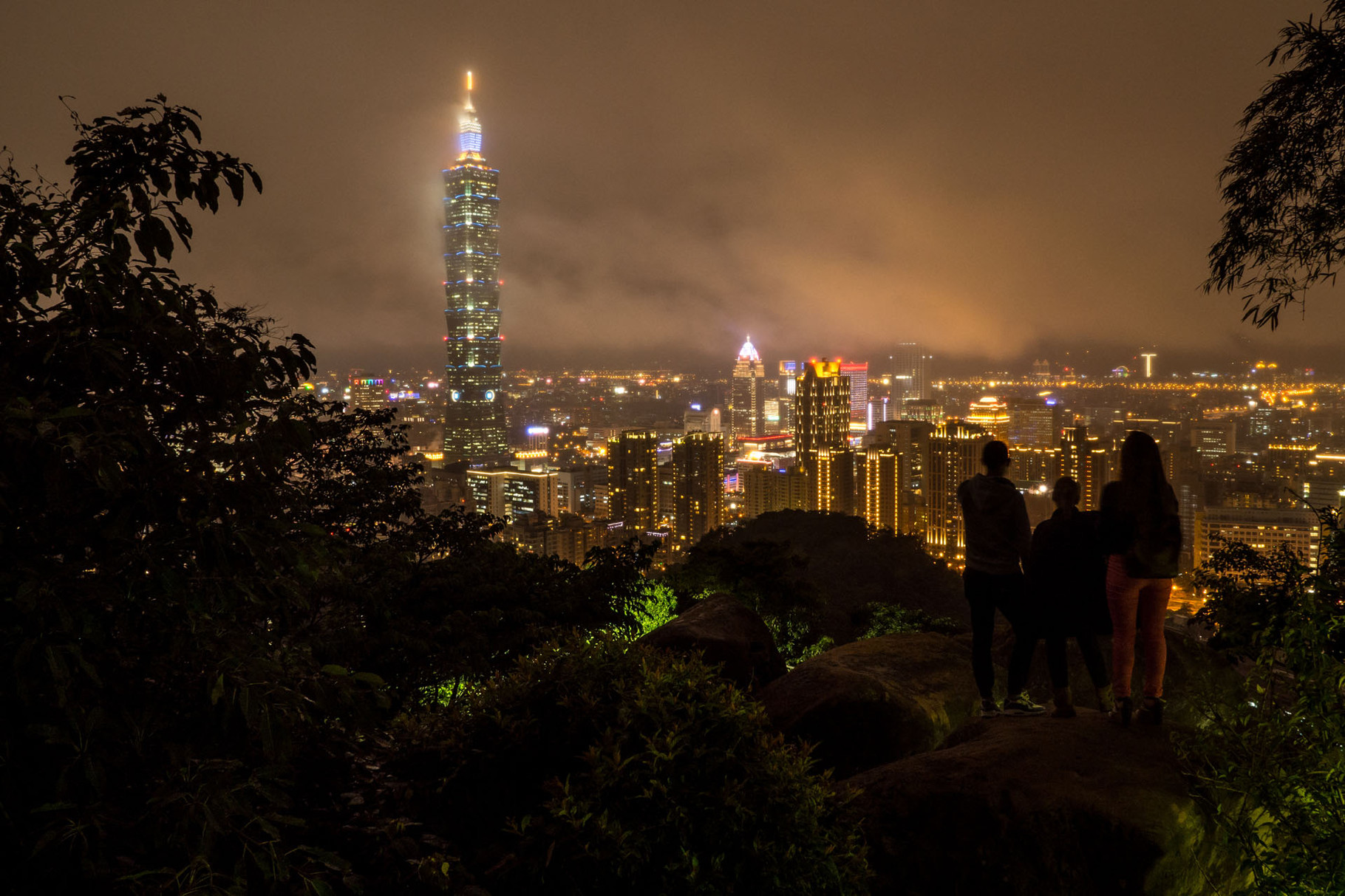 Taipei and the iconic Taipei101 tower during a cloudy night, photographed from the Elephant mountain