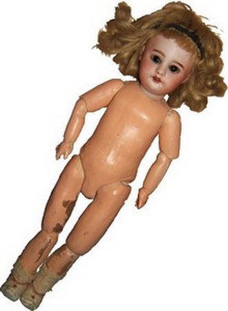 Poupée 301 tête porcelaine 150 €