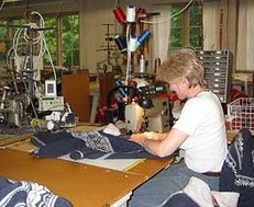 Norlender Wool worker sewing quality sweaters