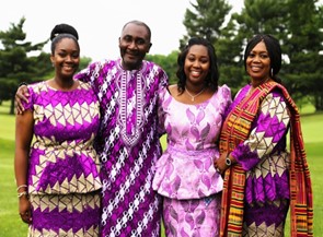 Photo of Louisa's family in 2018 dressed in Ghanian outfits for her sister's engagement ceremony.