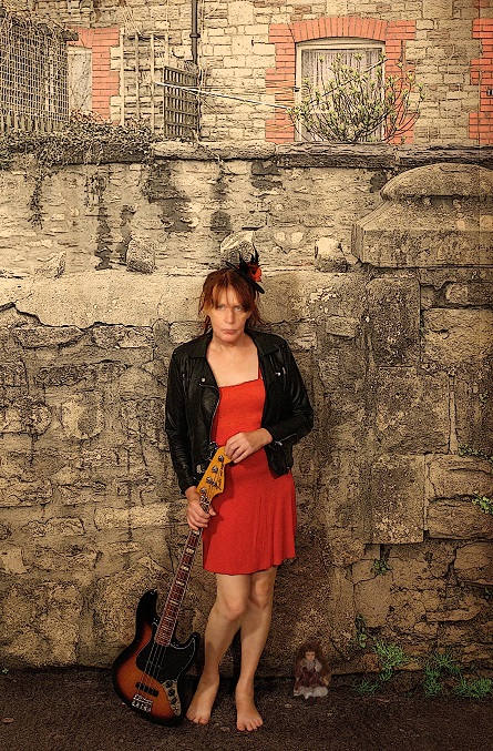The Bass Player & the Ginger Doll
